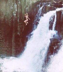 jumping into the waterfall
