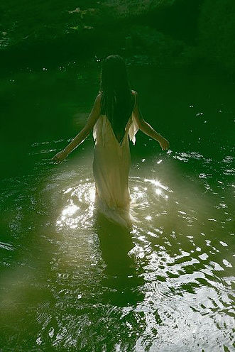 Woman entering water spiritual